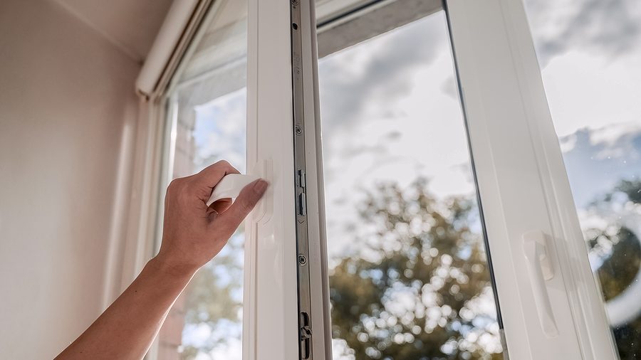 Opening a window for ventilation during a health and safety check